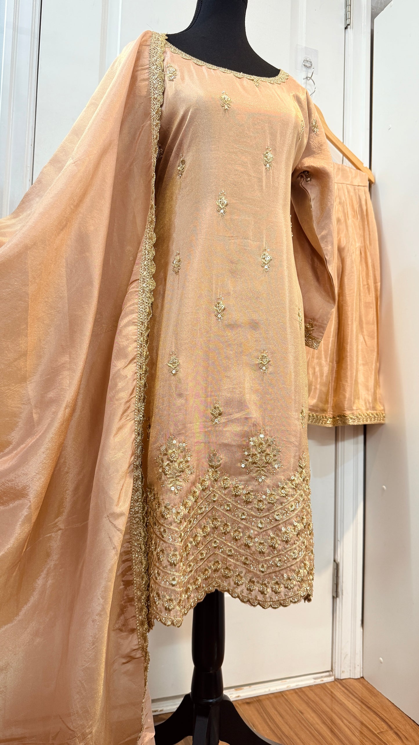 Party wear shimmer tissue garara suit