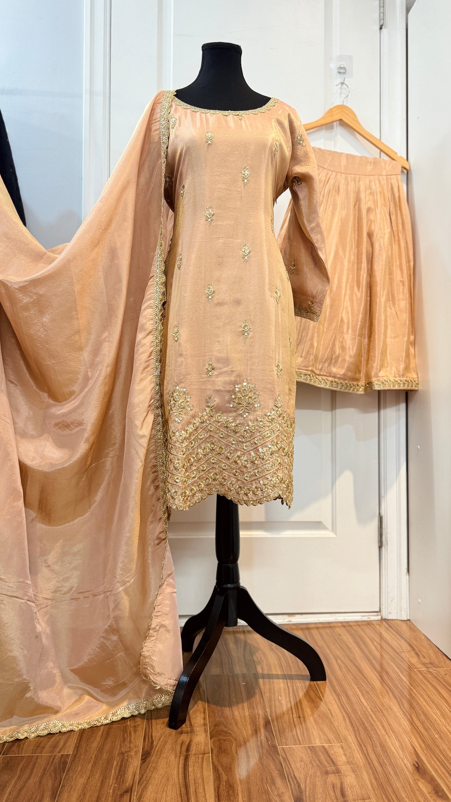 Party wear shimmer tissue garara suit